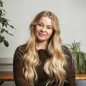 singing teacher looking at camera for a headshot
