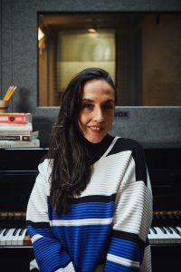 singing teacher looking at camera for a headshot