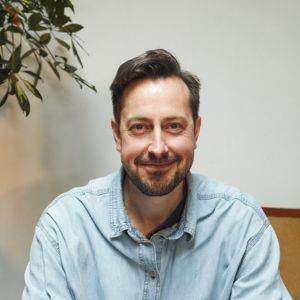 singing teacher looking at camera for a headshot