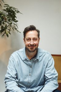 singing teacher looking at camera for a headshot