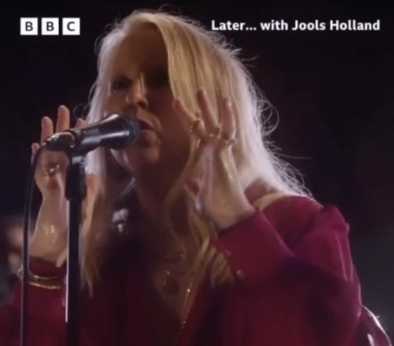 Polly Scattergood singing into a microphone on Later...with Jools Holland